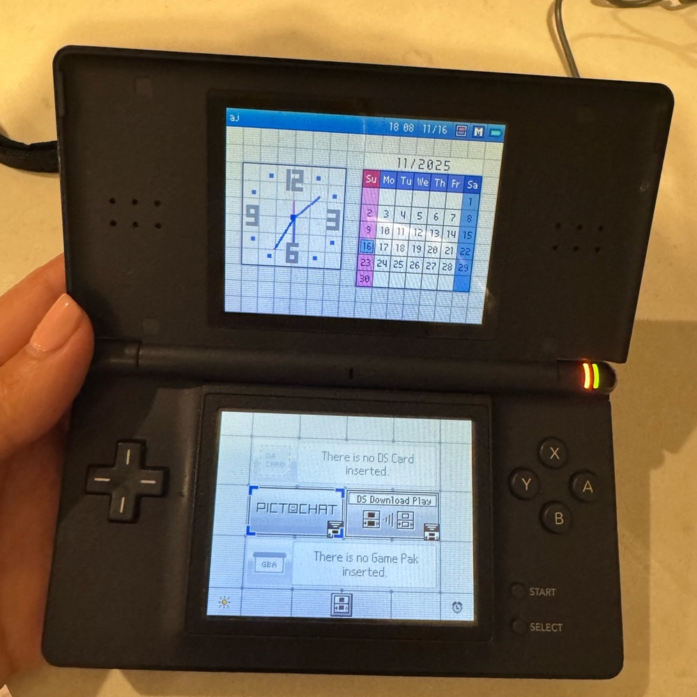 Nintendo DS Lite Midnight Black Handheld Console plus EIGHT GAMES and case!!!